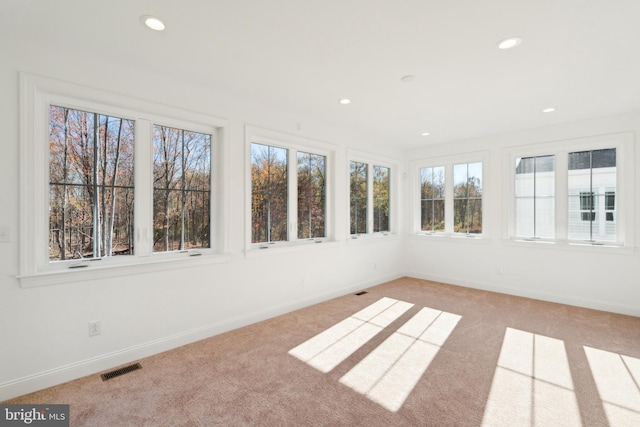 5095 Maple Ridge Way, Emmaus, PA 18049 - unfurnished sunroom with recessed lighting, carpet floors, healthy amount of natural light, and baseboards