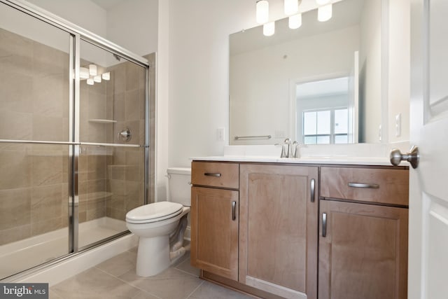 5095 Maple Ridge Way, Emmaus, PA 18049 - full bathroom featuring a stall shower, toilet, vanity, and tile patterned flooring