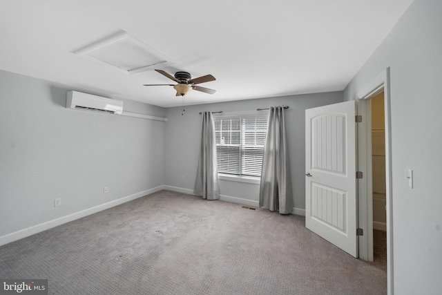 carpeted empty room featuring ceiling fan and an AC wall unit