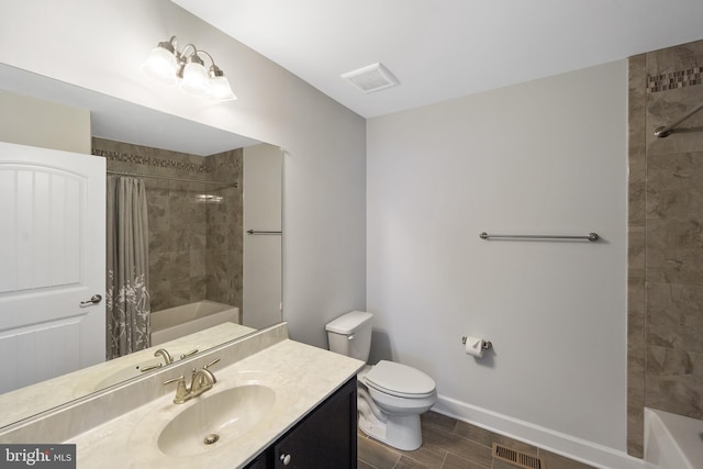 full bathroom featuring vanity, toilet, and shower / tub combo