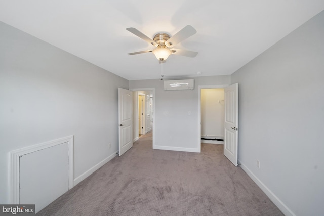 unfurnished bedroom featuring a wall mounted air conditioner, ceiling fan, light colored carpet, and a baseboard heating unit