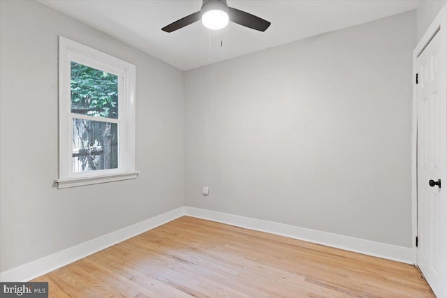 unfurnished room featuring ceiling fan and light wood-type flooring