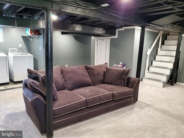 basement featuring washer and clothes dryer