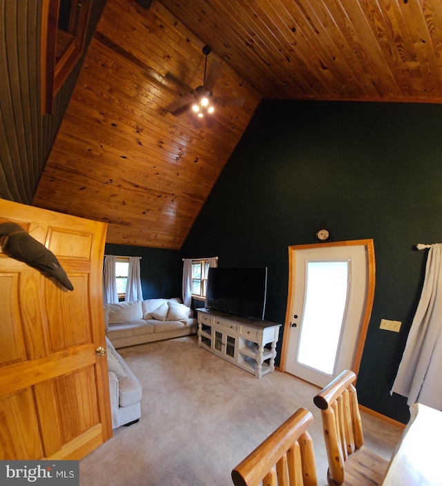 bedroom with light carpet, wooden ceiling, and lofted ceiling