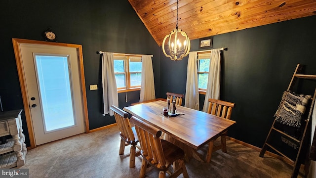 dining area with a notable chandelier, a healthy amount of sunlight, carpet floors, and wooden ceiling