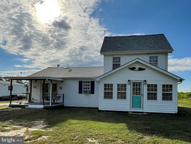 view of front of property with a front lawn