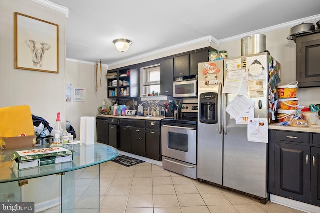 484 Brough Rd, Abbottstown, PA 17301 - kitchen featuring appliances with stainless steel finishes, ornamental molding, light countertops, dark cabinets, and light tile patterned floors