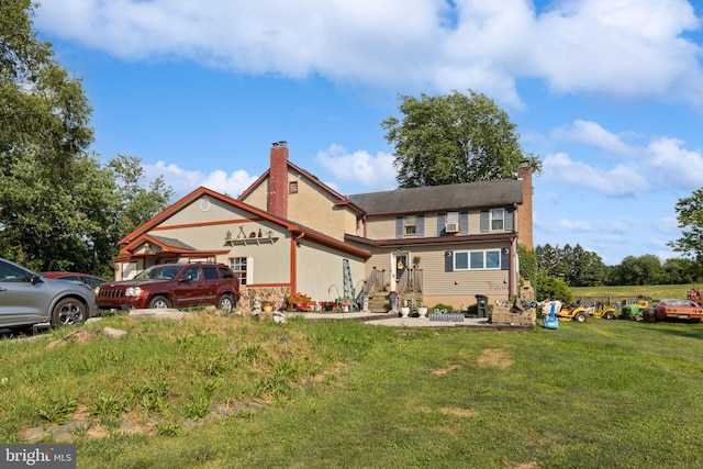 484 Brough Rd, Abbottstown, PA 17301 - back of property featuring a chimney and a lawn