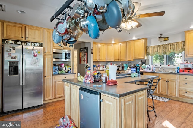 484 Brough Rd, Abbottstown, PA 17301 - kitchen featuring appliances with stainless steel finishes, dark countertops, light brown cabinetry, and recessed lighting