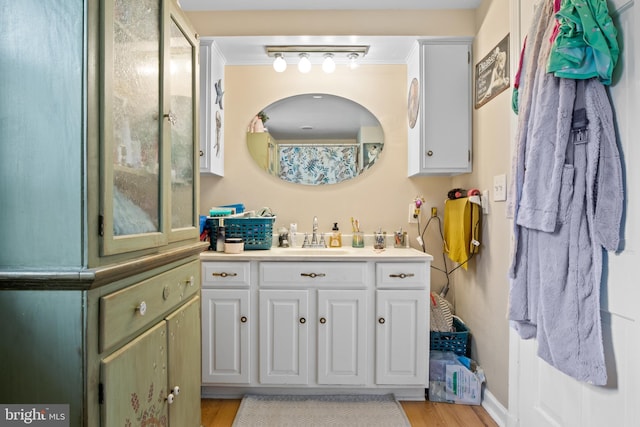 484 Brough Rd, Abbottstown, PA 17301 - full bathroom featuring vanity, wood finished floors, and ornamental molding
