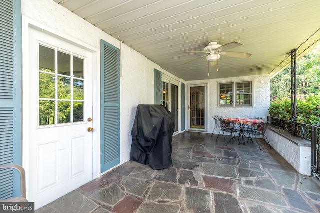 view of patio with ceiling fan