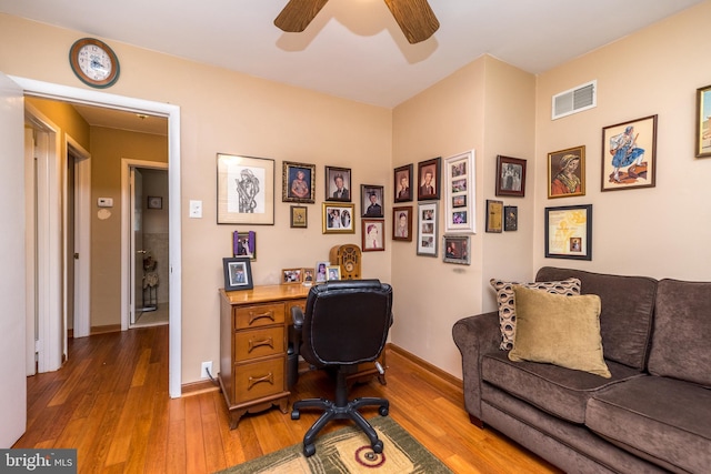 office featuring ceiling fan and wood-type flooring