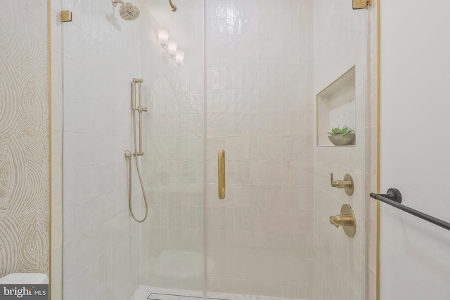 bathroom featuring walk in shower