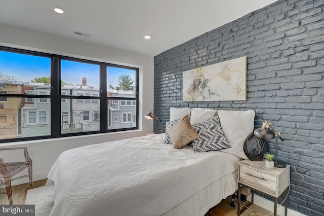 bedroom featuring hardwood / wood-style flooring