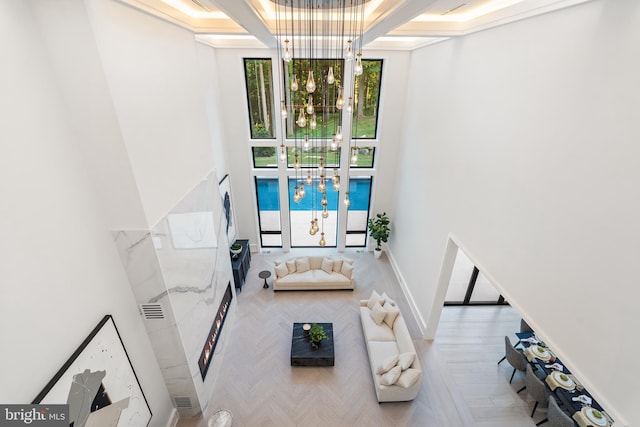 living room with a notable chandelier