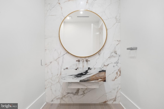 bathroom featuring wood-type flooring