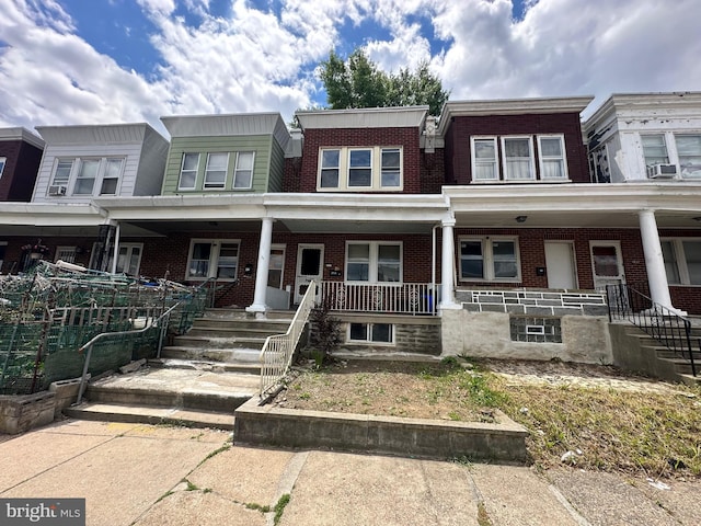 multi unit property featuring covered porch