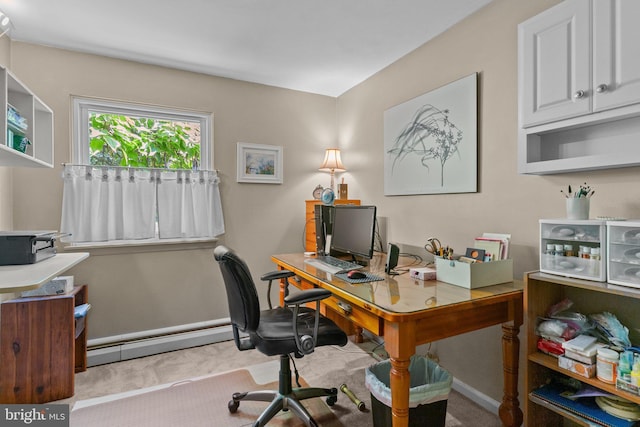 office area with baseboard heating and light carpet