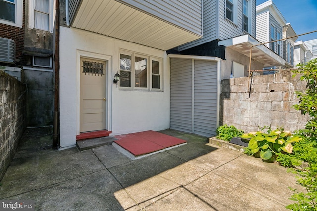 entrance to property featuring a patio area