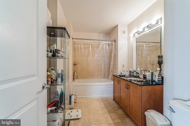 full bathroom featuring toilet, shower / bath combination with curtain, tile patterned floors, and vanity