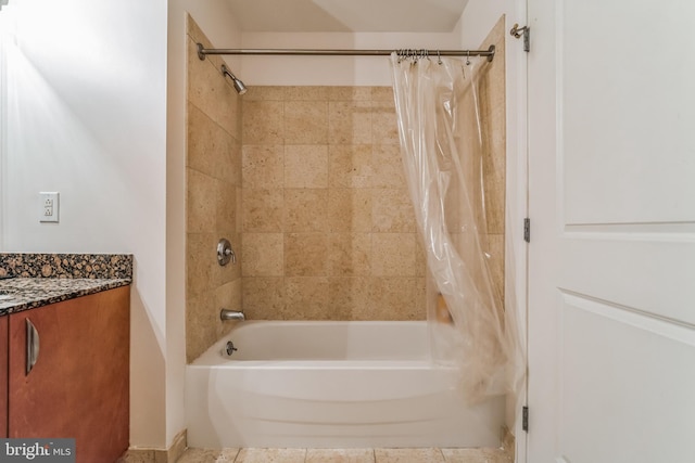 bathroom with vanity and shower / bath combo