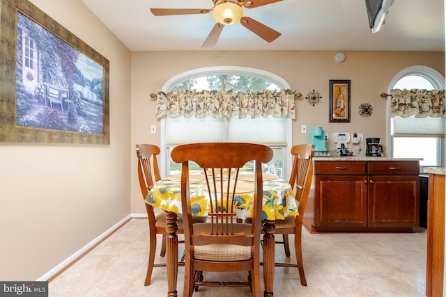 dining space with ceiling fan