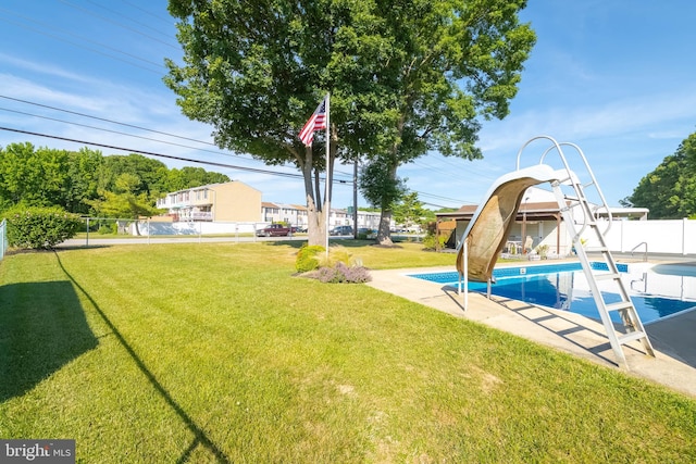 exterior space featuring a patio and a fenced in pool