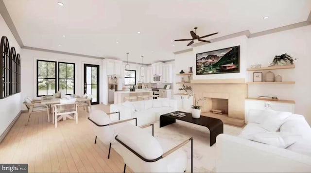 living room featuring light hardwood / wood-style floors, ceiling fan, and ornamental molding