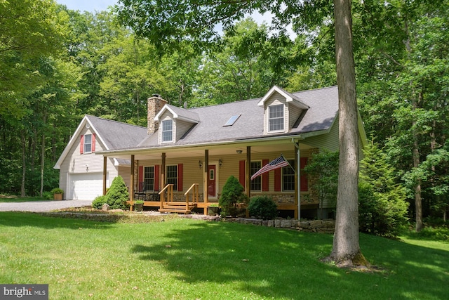 cape cod house with a porch and a front yard