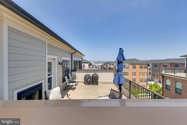 view of patio / terrace with a balcony