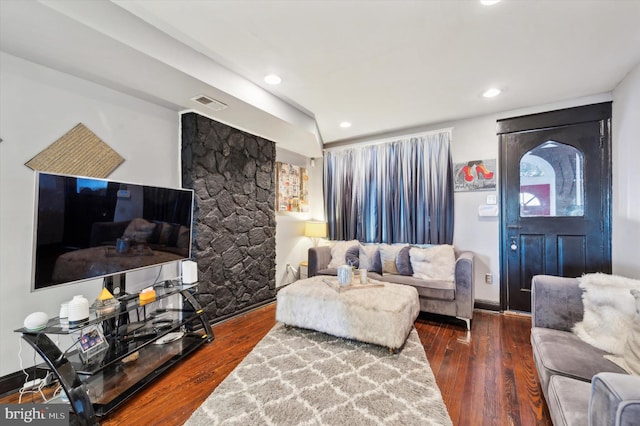 living room featuring dark hardwood / wood-style flooring