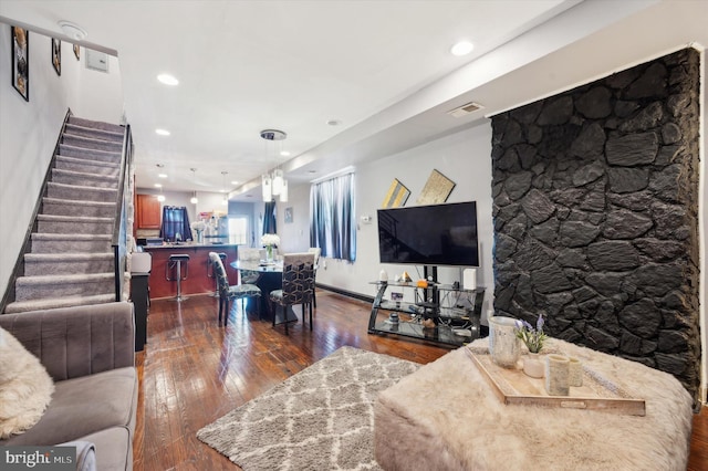 living room featuring dark hardwood / wood-style floors