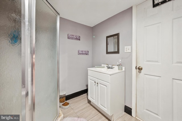 bathroom featuring vanity and walk in shower