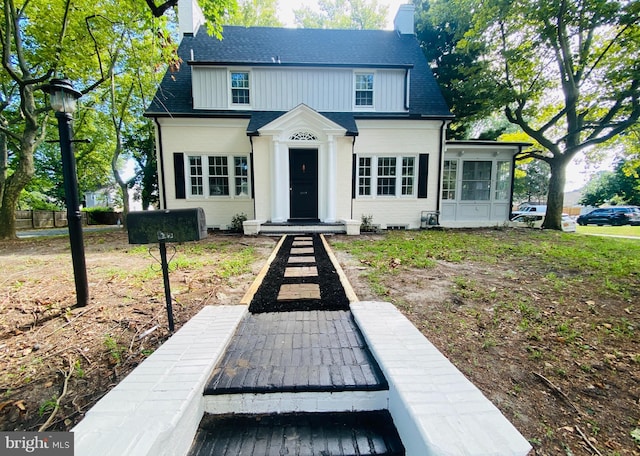 view of front facade featuring a sunroom