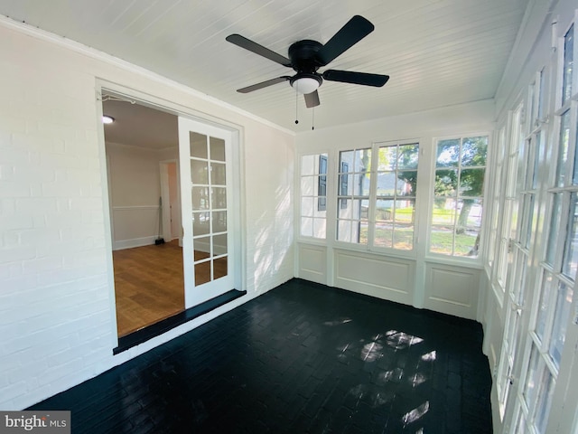 doorway with french doors and hardwood / wood-style floors