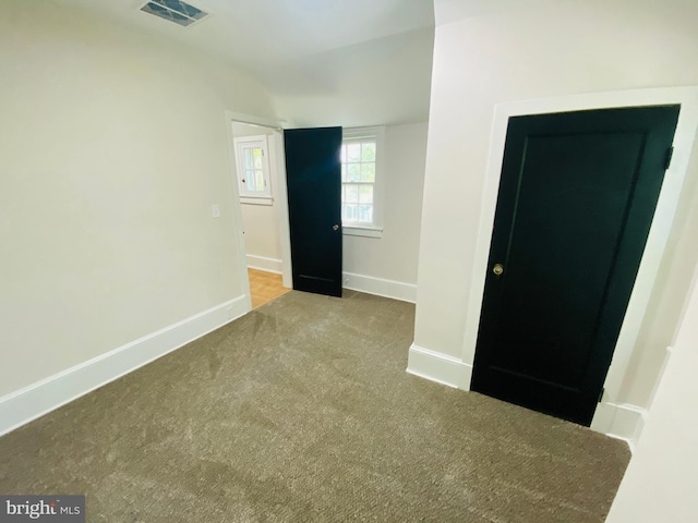 view of carpeted spare room