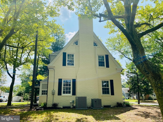 view of property exterior featuring central air condition unit