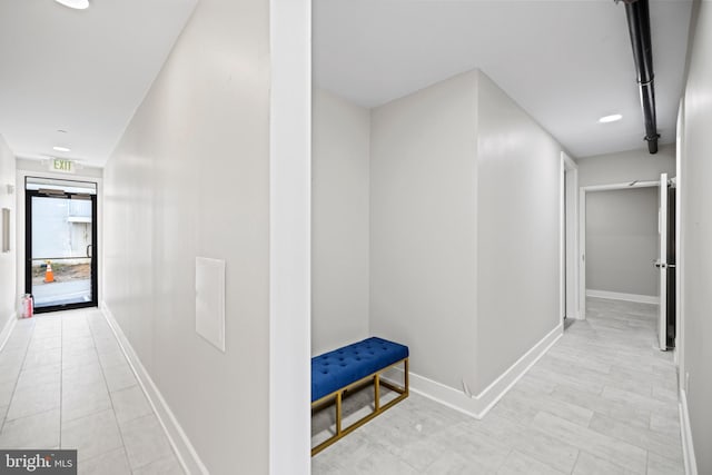 corridor with baseboards