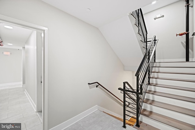 stairway with baseboards