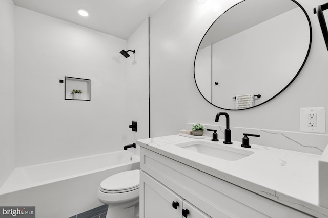 full bathroom with vanity, shower / bathtub combination, and toilet