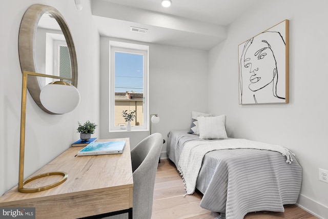 bedroom featuring light wood-type flooring