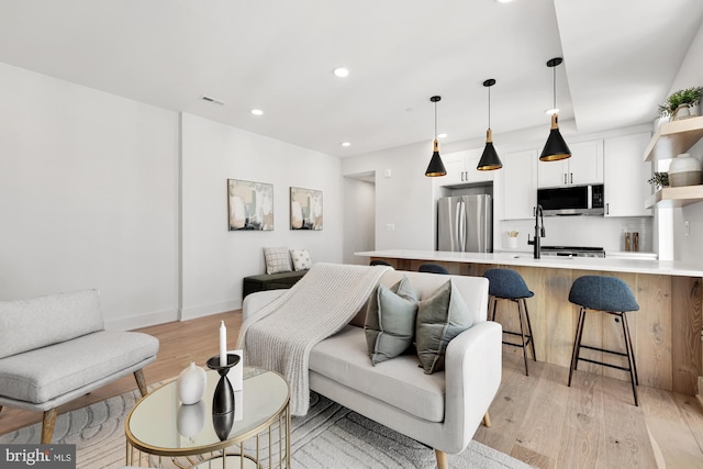 living room featuring light hardwood / wood-style floors