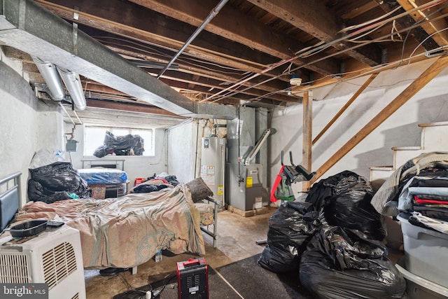 basement featuring gas water heater and heating unit