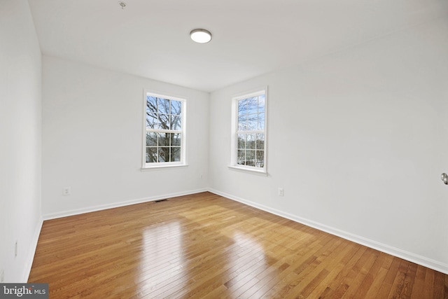 empty room featuring light hardwood / wood-style flooring