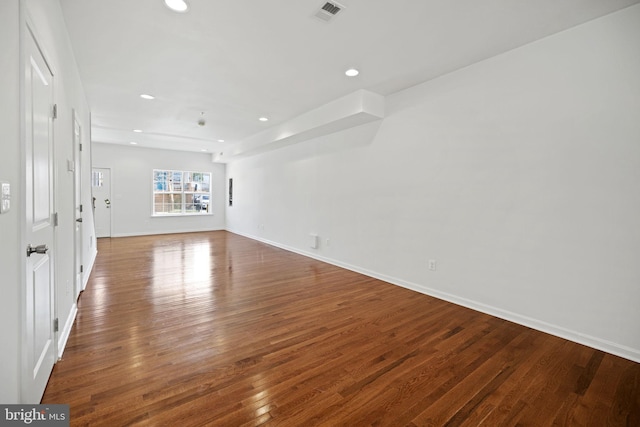 interior space with dark hardwood / wood-style flooring