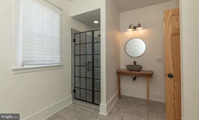 bathroom featuring tile patterned floors and sink