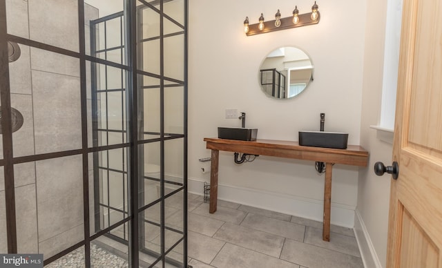 interior space with tile patterned floors and walk in shower