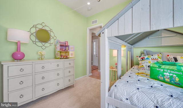 bedroom with light carpet