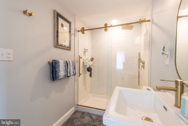 bathroom featuring sink and walk in shower