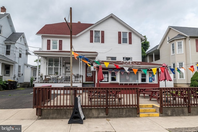 view of front of property featuring covered porch